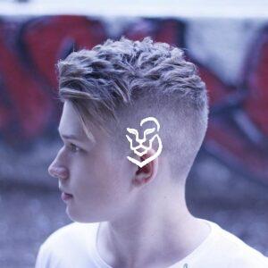 Textured Undercut Haircut For Men With A Long Fringe